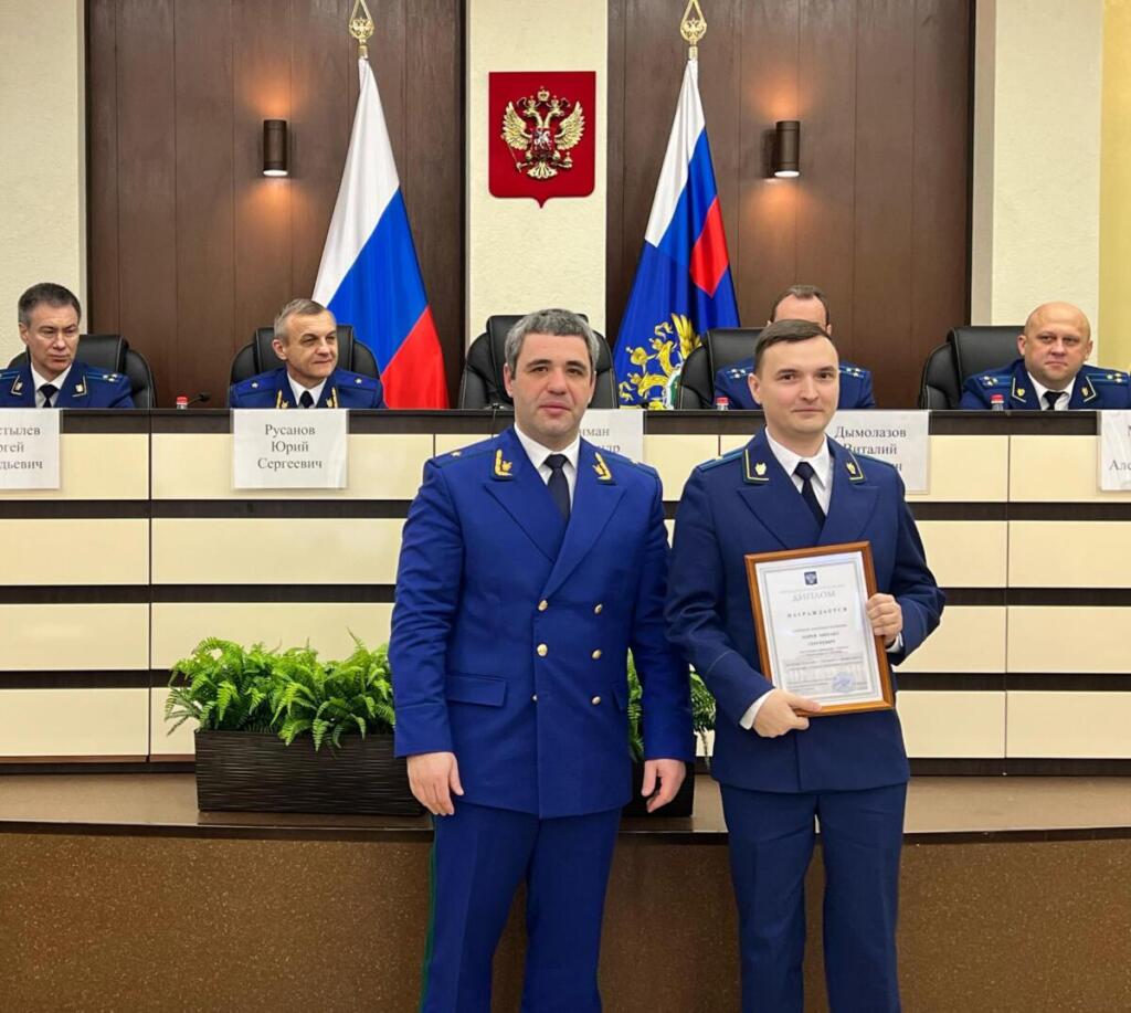 Михаил Сергеевич Хорев (на фото справа)