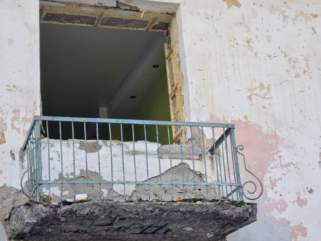 Аварийный дом